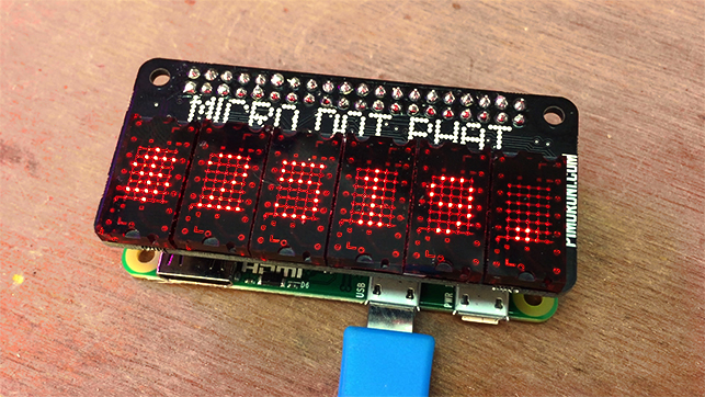 Pimoroni's microdot phat displaying Bitcoin program